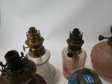 a lot of glass bottles with different colors on them