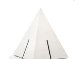 a white paper pyramid with a black stripe on it