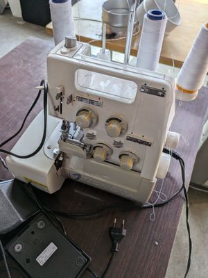 an image of a sewing machine on a table