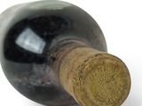 a bottle of wine with a cork stopper on it