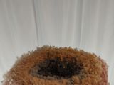 a close up picture of a piece of fabric with a hole in it