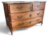 a wooden dresser with marble top on a white background