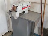 a machine that is sitting in the corner of a room