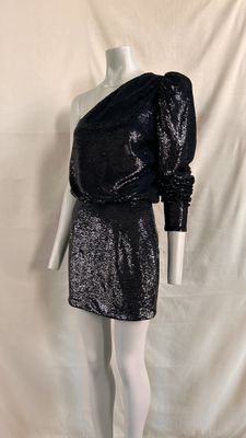 a mannequin wearing a black dress with one shoulder and a black top
