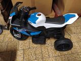 a toy motorcycle that is sitting on the floor