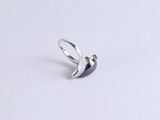 sterling silver ring with a black stone and a white diamond
