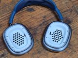 a pair of headphones sitting on a wooden floor