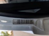 a close up of a piece of luggage with a barcode on it