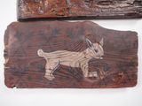 two pieces of wood with a picture of a cat on them