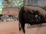 two cardboard boxes filled with various types of electrical wires