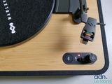 a turntable with a remote on top of it