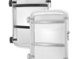 two pieces of luggage sitting next to each other on a white surface
