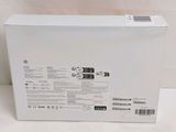 the back of a white box with a black and white logo on it