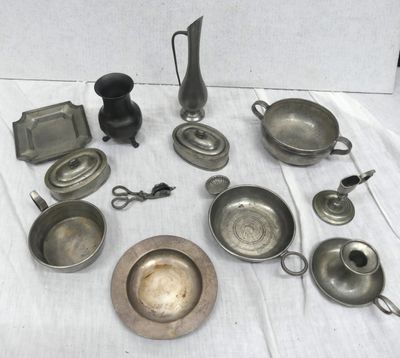 a lot of silver items that are on a table