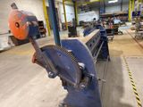 an image of a machine in a factory that is being worked on