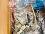a box full of electronic equipment that is sitting on a table