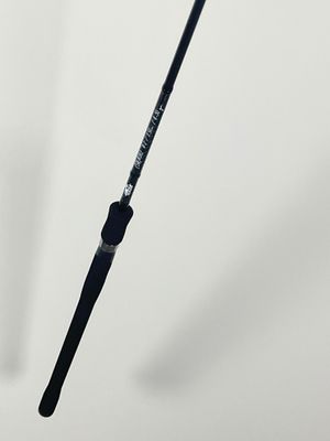 a close up of a fishing rod on a white background