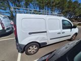 a white van that is parked in a parking lot