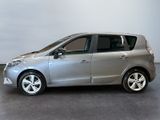 a picture of a silver minivan parked in a garage