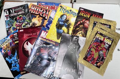 a box full of comic books sitting on a table