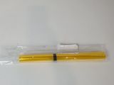 a yellow pen that is sitting on a white table
