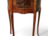an old wooden table with a drawer on top of it
