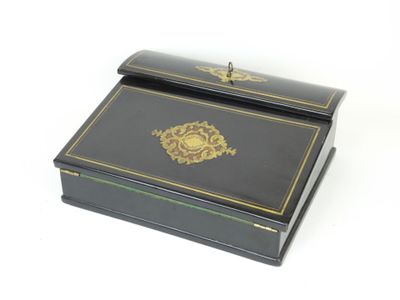 an image of a black box with a gold design on it