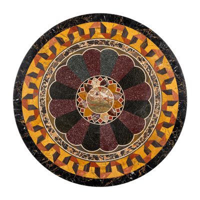 a picture of a marble table top with a design on it