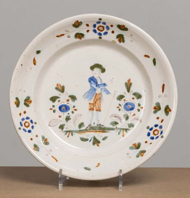 SUD-OUEST. Plat en faïence à décor polychrome d'un jardinier…