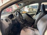 the interior of a car with dirty seats and a dirty steering wheel