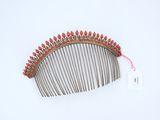 an image of a hair comb on a white surface