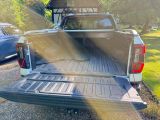 a truck that is sitting in the back of the truck