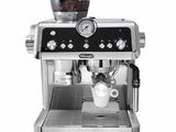 an image of a black and silver coffee machine on a white background