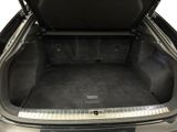 the trunk of a car with the boot lid open