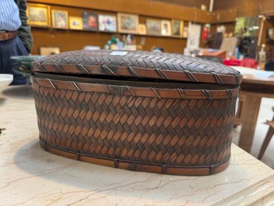 a wooden box sitting on top of a table