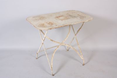 an image of a small table with a white top and legs