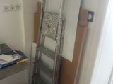 a ladder leaning against a wall in a room