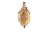 a gold locke with a picture of a woman on it