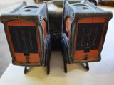 two pieces of luggage sitting on top of a table