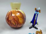a lot of glass figurines that are on the table