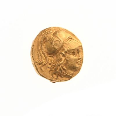 l'image d'une pièce d'or sur laquelle figure le visage d'une femme