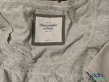 an image of a close up of a shirt with a label on it