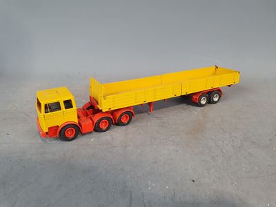 a toy truck that is sitting on the floor