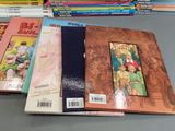 a lot of books that are on the table