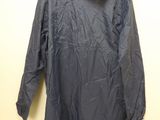 an image of a black jacket hanging on a wall