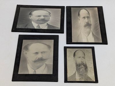 plusieurs vieilles photos en noir et blanc d'hommes barbus et moustachus