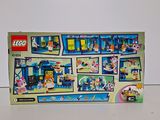 a box of legos on a table with a white background
