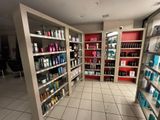 many shelves of hair products in the store