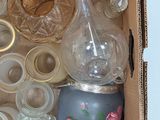 a box full of glass items that are sitting in it