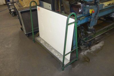 a picture of a machine that is working on a piece of paper